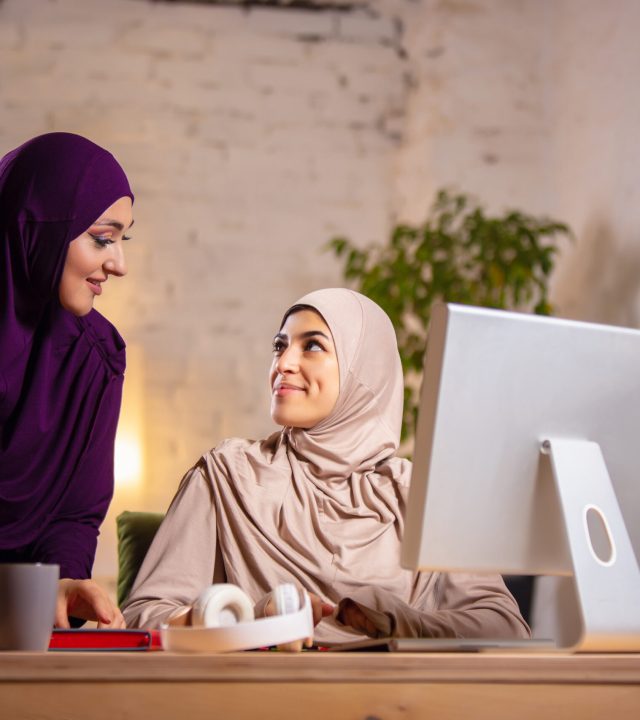 Happy muslim woman at home during online lesson. technologies, remote education, ethnicity concept